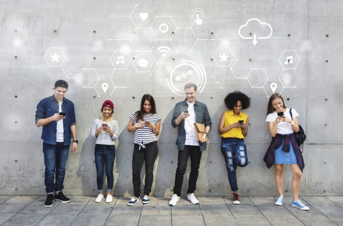 Diverse people using their phones Digital Communities